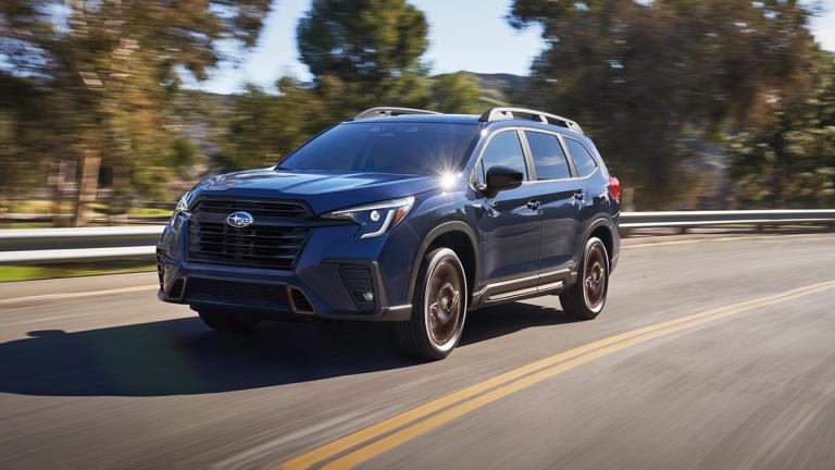 2025 Subaru Ascent in blue on the road.